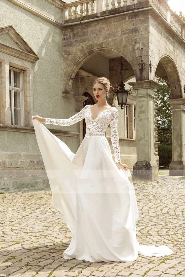 white flowing dress with sleeves