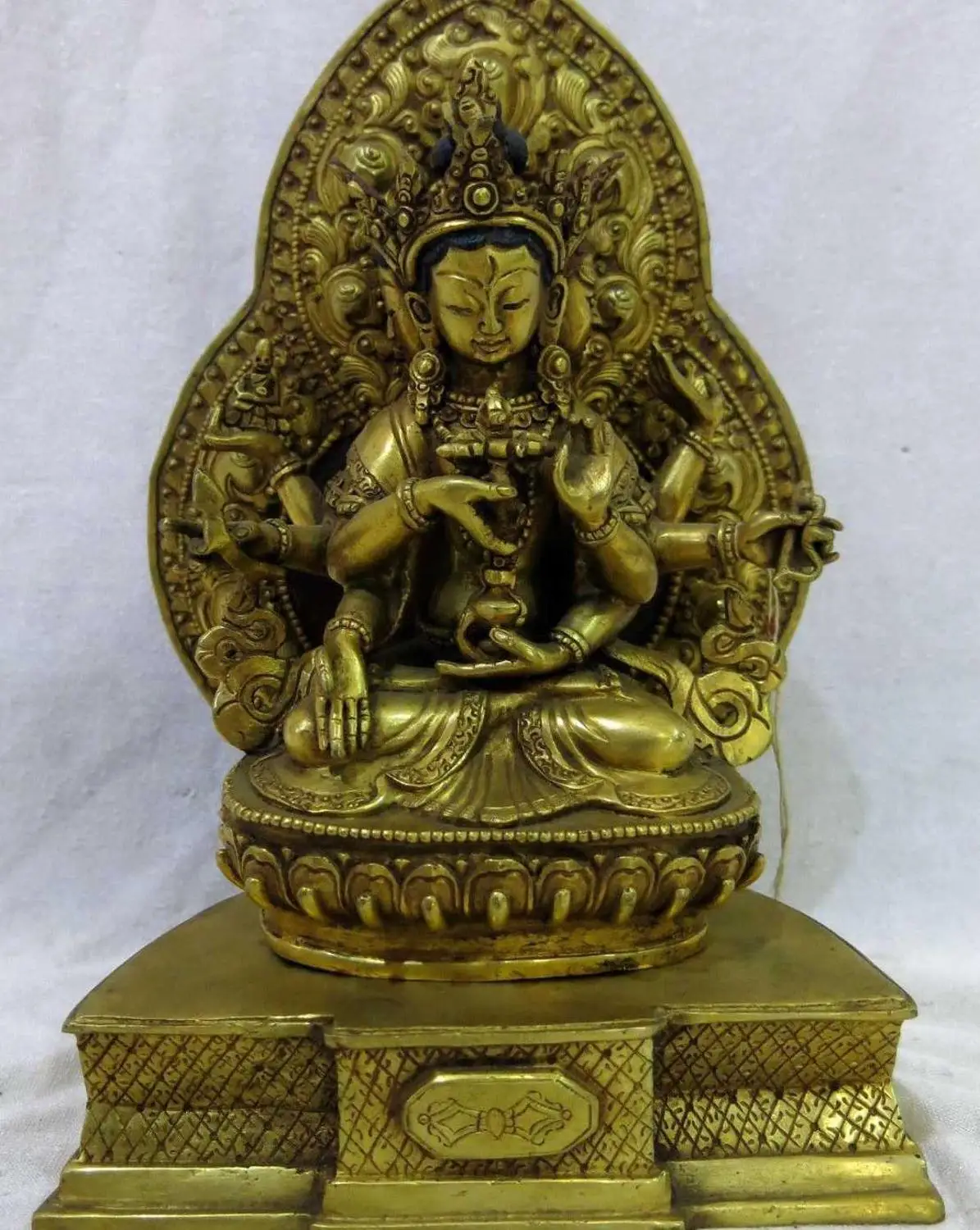 

9" Tibet bronze gilt carved fine 8 arm 3 head Guanyin sculpture Kwan-yin Statue