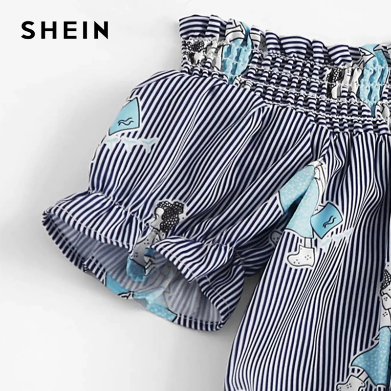 SHEIN كيدي Smocked الكرتون طباعة الباردة الكتف مخطط أعلى و كشكش التنانير الفتيات الملابس 2019 الصيف الاطفال الملابس SHEIN كيدي Smocked الكرتون طباعة الباردة الكتف مخطط أعلى و كشكش التنانير الفتيات الملابس 2019 الصيف الاطفال الملابس