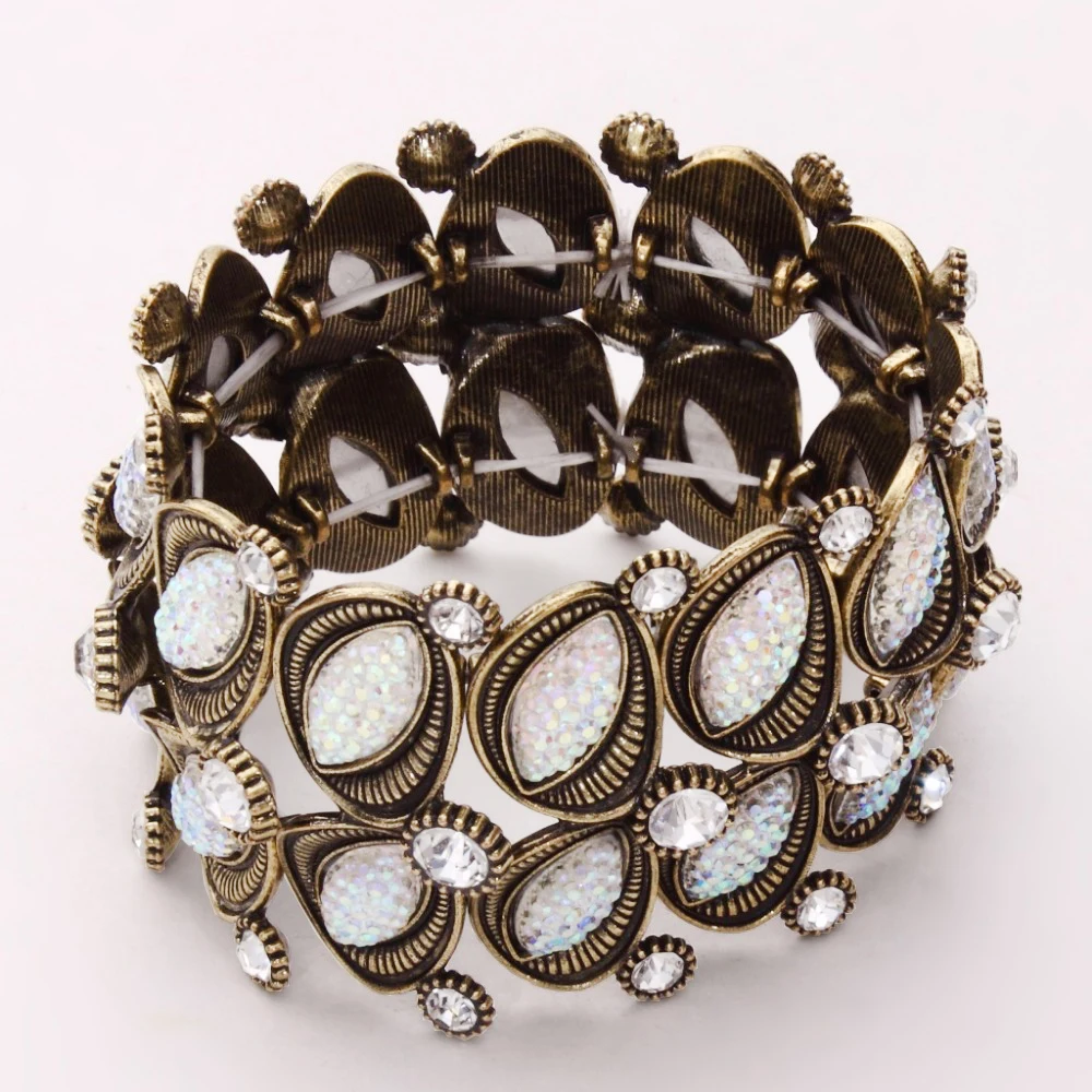 

Free Shipping Crystal Wide Metal Bangles for Women Eye Pattern Strench Bracelets Bangle Pulseiras CM-E1524