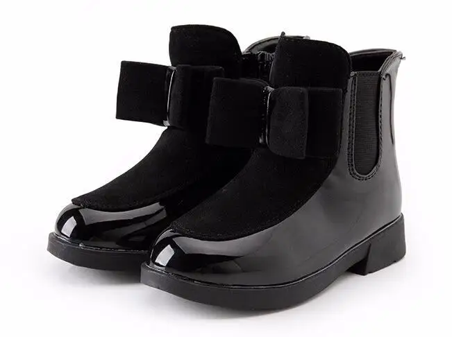 

2018A autumn and winter boots children's shoes girls bow in the wind with mid-top of the British carved boots