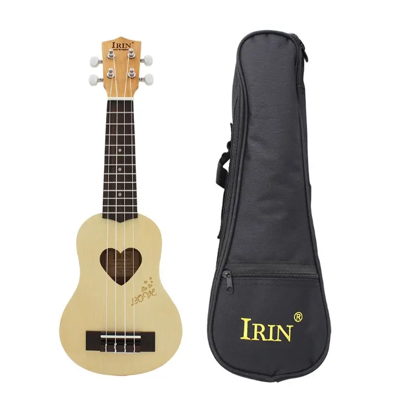 

Ukulele 17 inch 12 Fret Uke 4 Nylon String Heart L Engrave Wood Guitar2