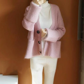 

In the spring of 2018 new cardigan sweater coat sweater loose woman thickened cardigan cashmere sweater.