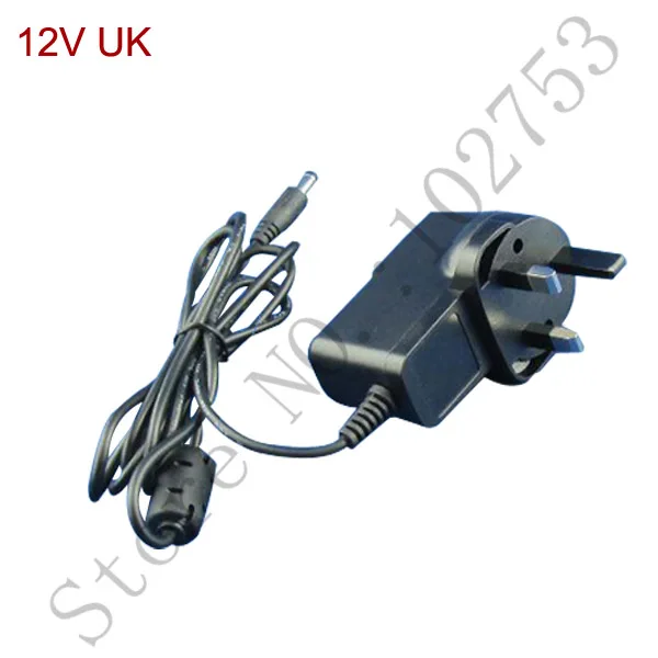 1pcs 12W 220v to 12v adapter UK plug free shipping certified 100 new