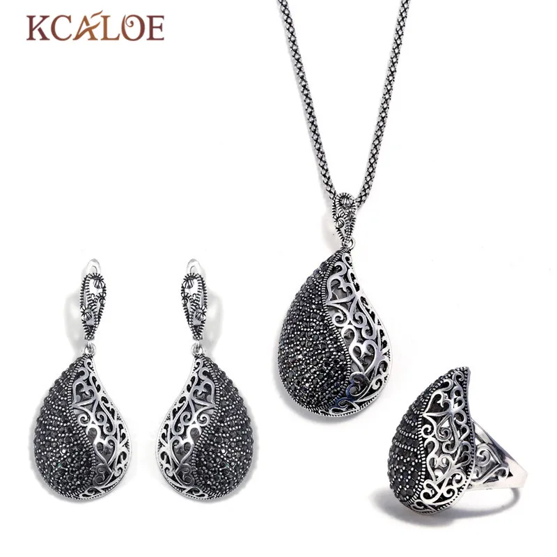 

KCALOE Women Jewelry Set Black Crystal Rhinestone Hollow Waterdrop Necklace Pendant Earrings And Ring Vintage Jewellery Sets
