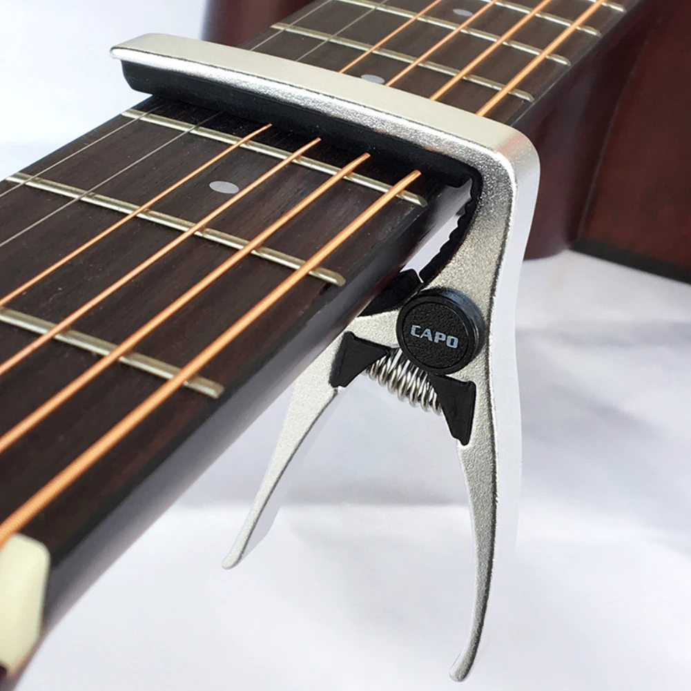 kexinda Guitar Capo rationalisée Aluminium Cordes de Guitare Clip de Serrage avec poignée en Silicone Ressort en Acier Inoxydable Rouge 