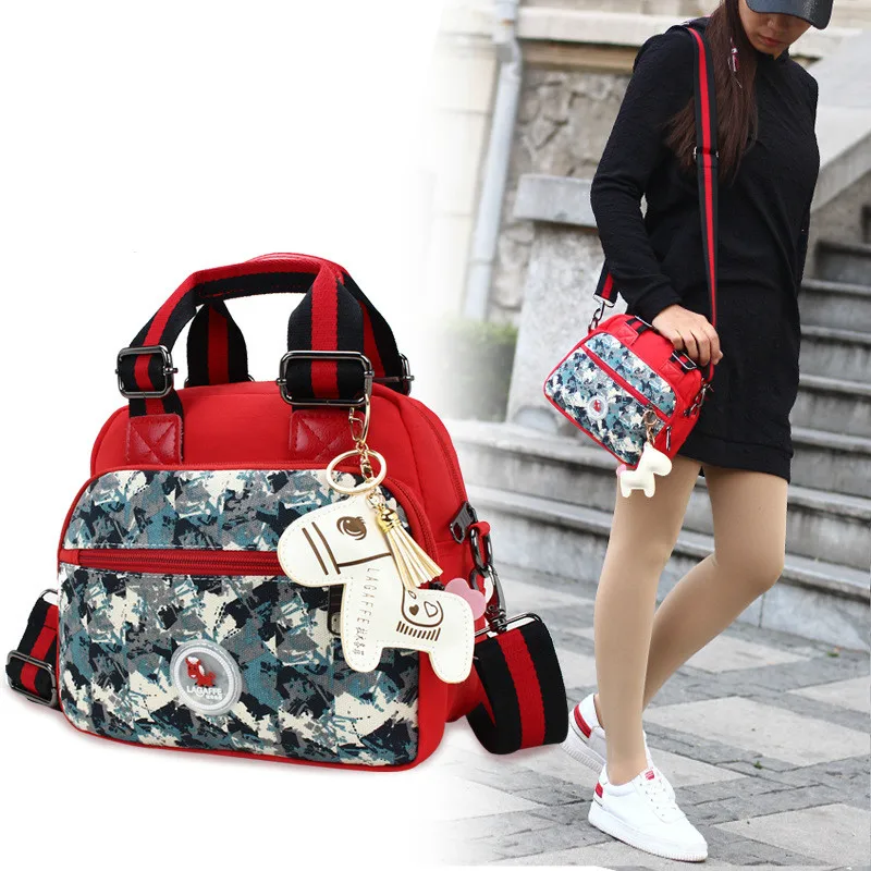 

Fashion women's bag 2019 new confused color single shoulder diagonal nylon cloth bag double-sided Oxford portable handbag