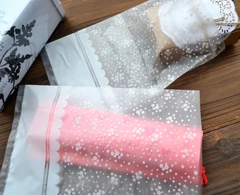 

100pcs 16x26cm White flowers clear plastic bag gift bag candy cookies bag for christmas Wedding party supplies Packaging bag