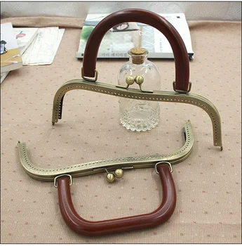 

Antique Brass Metal Purse Frame Sewing Purse Frame With Wood Bag Handle Size 27 CM DIY Accessories Handbag Hanger Strap Chain