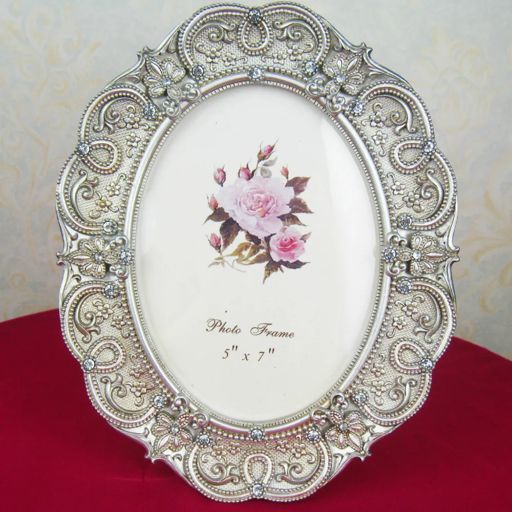 Foto home decorative soft decoration resin photo frame / 5*7 inches 13*18 picture frames في Foto