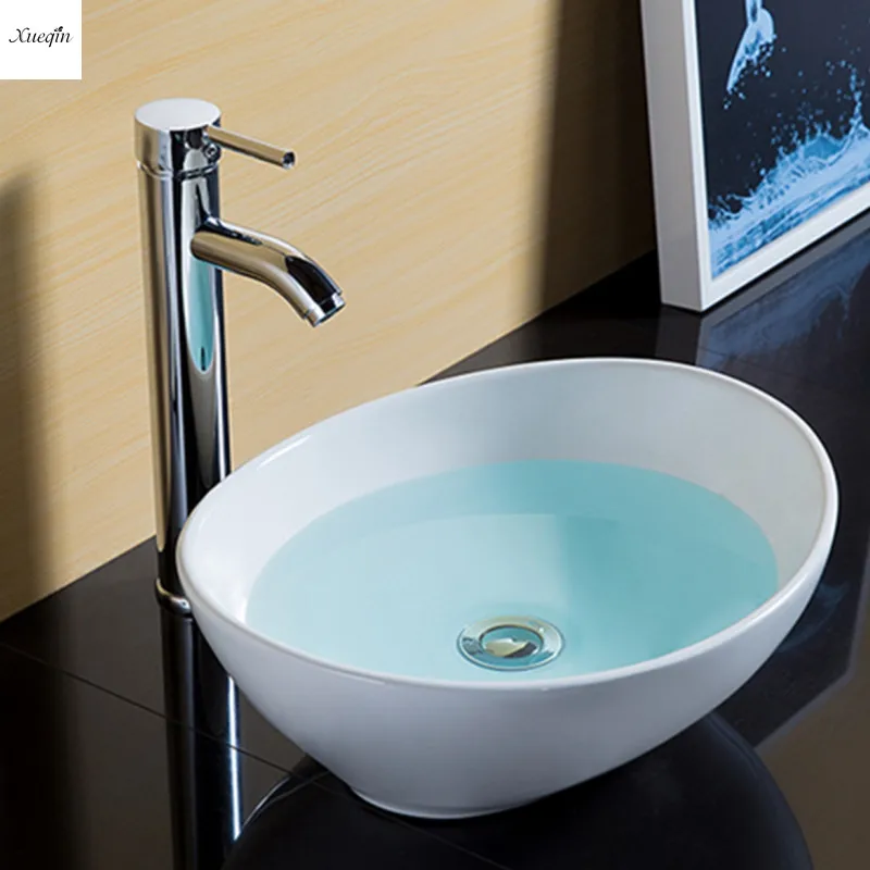 

Xueqin 16 Inch Oval Bowl Ceramic Bathroom Vessel Vanity Sink White Artistic Basin Faucet Modern Style Wash Basin Bathroom Sink