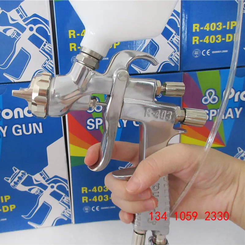 Pressure spray gun