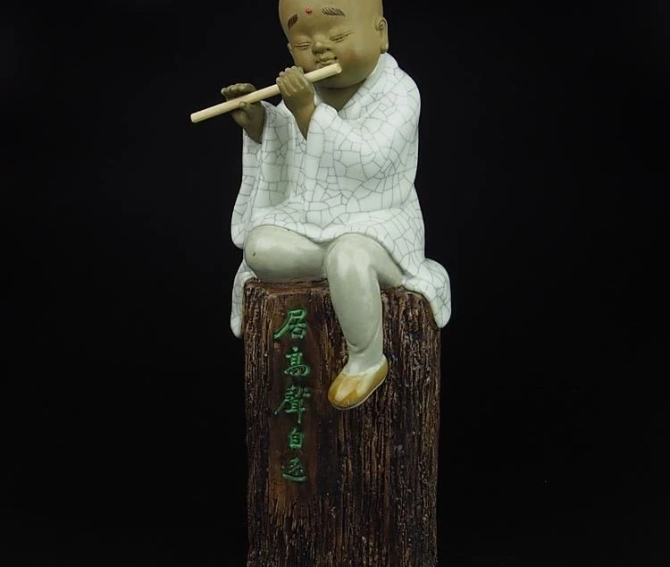 

China Art Pottery Wucai Porcelain Buddhist Monk Blowjob Flute Statue Sculpture
