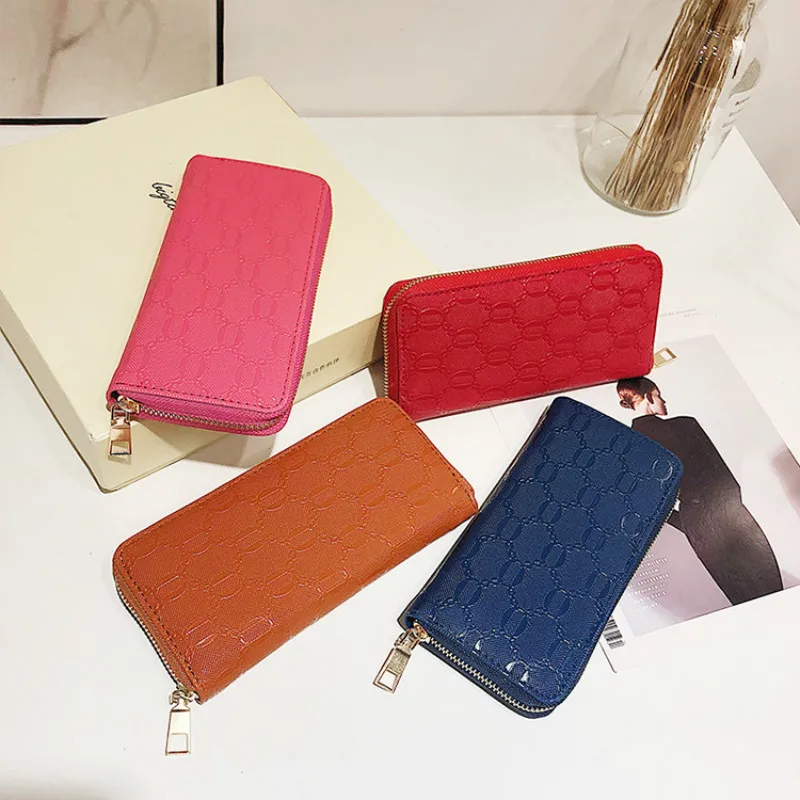 

2019 women's bag hot new long zipper solid color trend change multi-card position simple hand-held fashion portable wallet