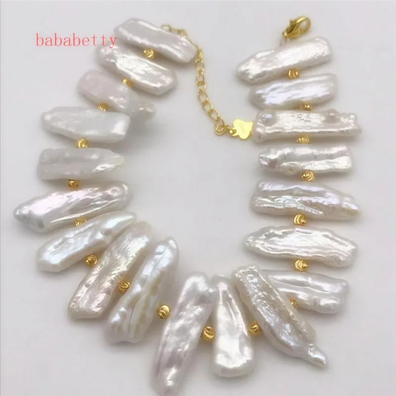 

Natural freshwater pearl irregular shape White light pink Light purple pipa pearl bracelet 7-26MM 7inches +4 chain 001