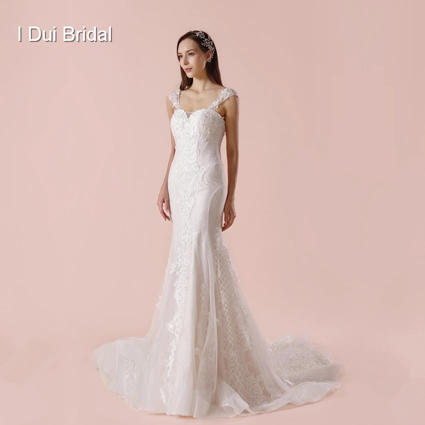

Sleeveless Sheath Wedding Dress Chapel Train Unique Lace Appliqued Bridal Gown