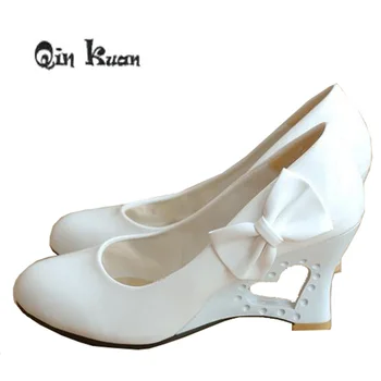 

Qin Kuan Spring Women Wedding Pumps Bowtie Patent Pu Leather Ladies High Heel Wedge Girls Shoes Plus Size 34-43
