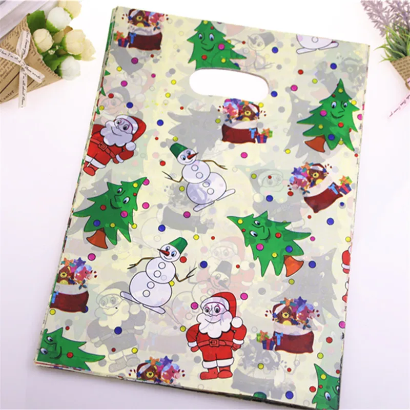 

New Design Wholesale 100pcs/lot 25*35cm Santa Claus Gift Packaging Wedding Favors and Gifts Large Plastic Christmas Gift Bags