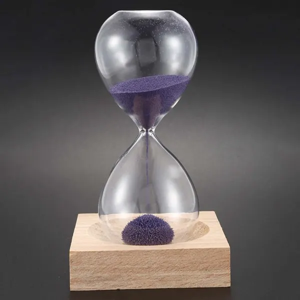 

wood + glass + iron powder sand iron flowering magnetic hourglass 13.5 * 5.5cm wooden seat with packaging Gift