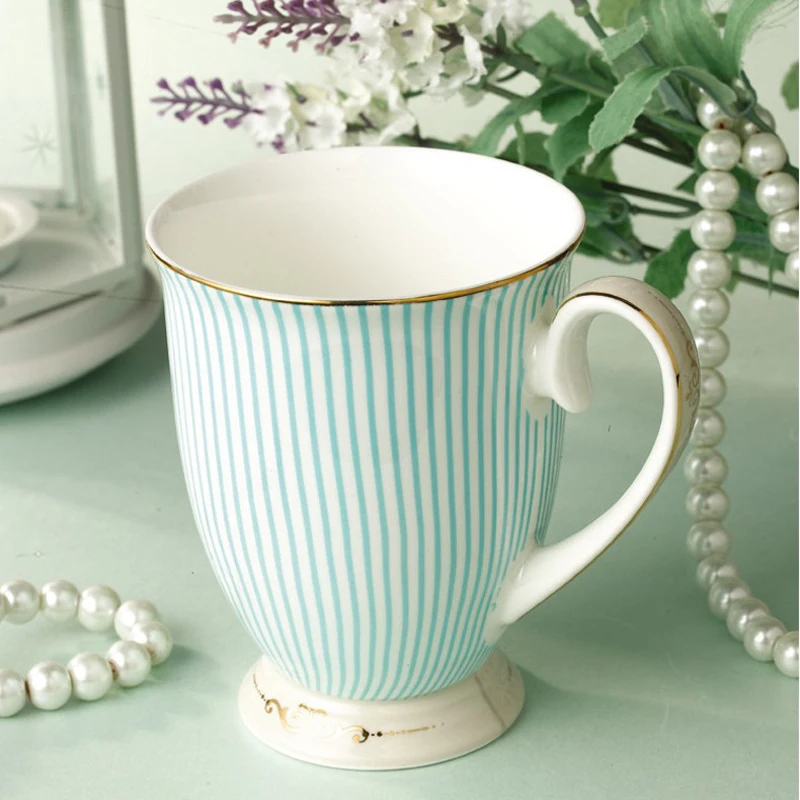 

Elegant Tea cups British Purified Ceramic Cups Bone China Blue Stripes Coffee cup Golden Pattern Fashion Unique Design Goblet