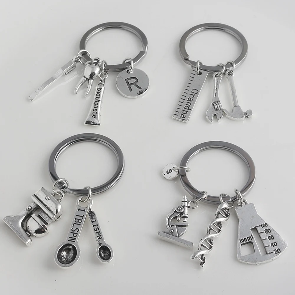

SG 2018 Newest Fashion 10 Pcs/lot 4 Style Job Occupation Women&Men Keychain Dentist Chef Biochemist Engineer Keyring Key Chains