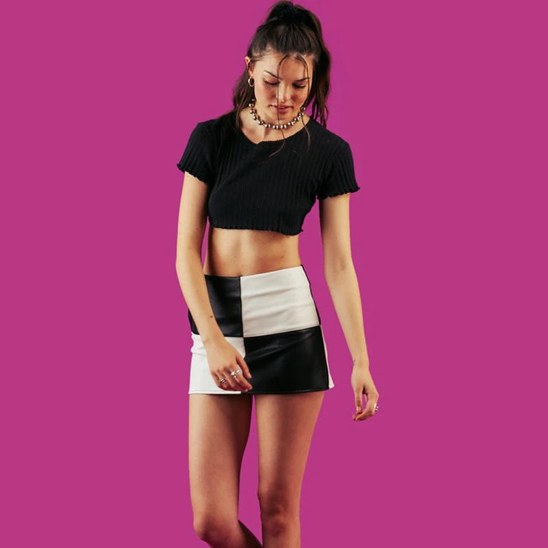 

Unif leather mini Skirt women Black White plaid Slim sexy Skirts PU Saia punk fashion classic Saias