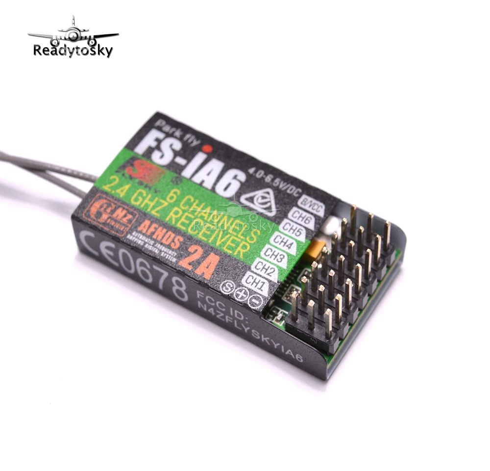 Récepteur Flysky FS-iA6B avec ses deux antennes dépliées, prêt pour installation sur un drone
