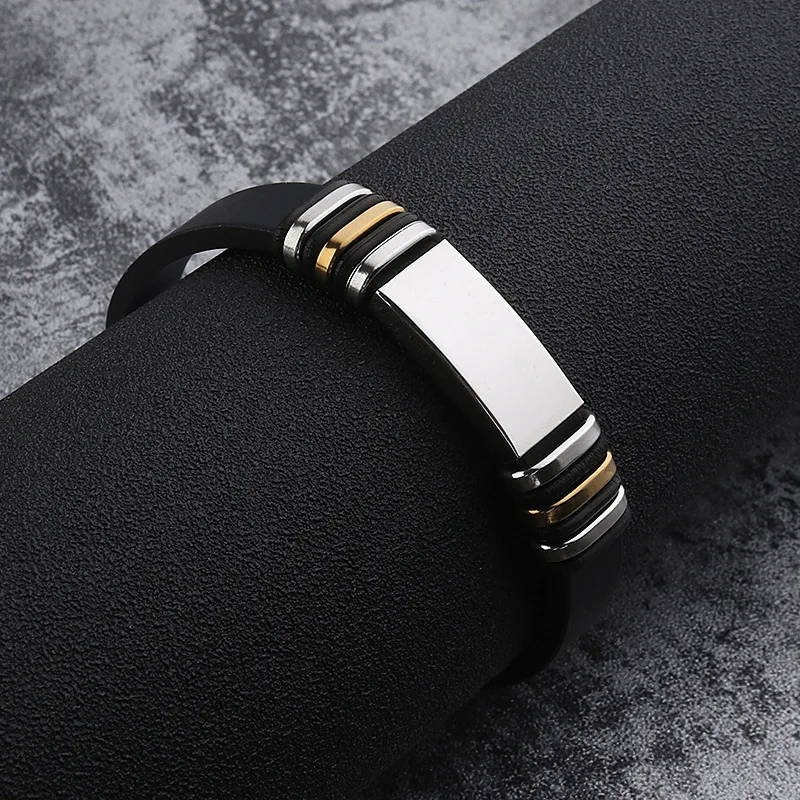 

Drop Shipping Selling Europe Fashion Stainless Steel Slide Charm Bracelet with Stainless Steel Clasp Silicone Bracelet for Men