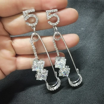

Mimiyagu big pin crystal earring for women cubic earring