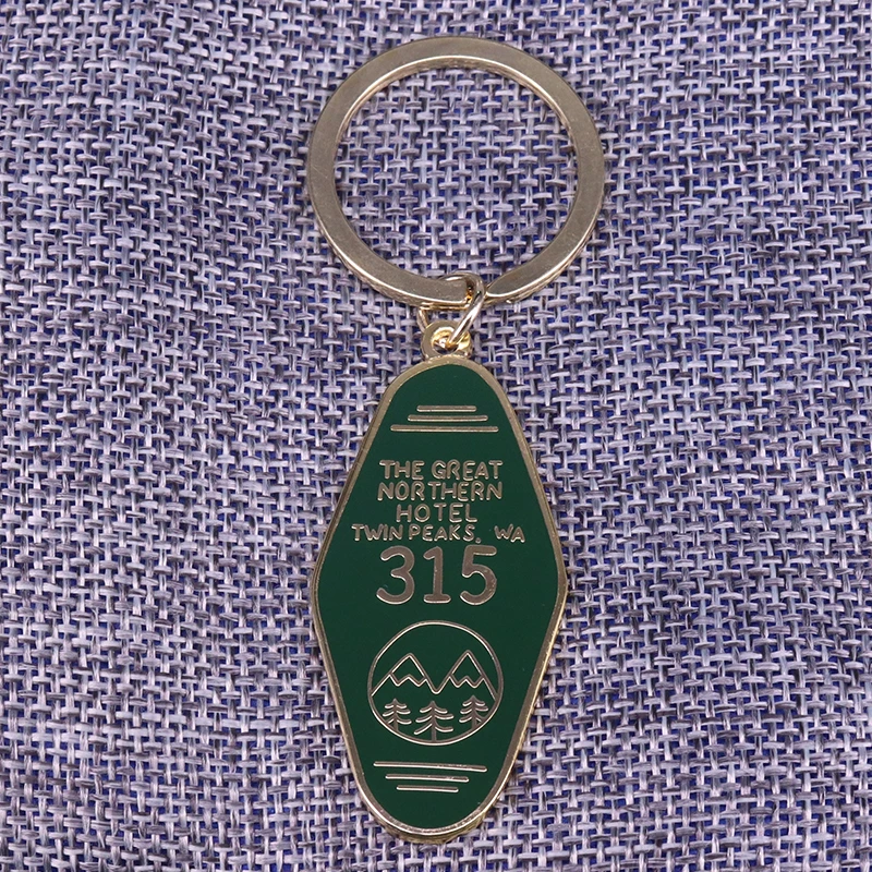 ON SALE Gold printed TWIN PEAKS Inspired "Great Nothern Hotel" keychain ON SALE Gold printed TWIN PEAKS Inspired "Great Nothern Hotel" keychain