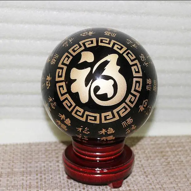 

Natural obsidian crystal ball feng shui ornaments Lucky evil spirits block evil Bedford town house 15cm