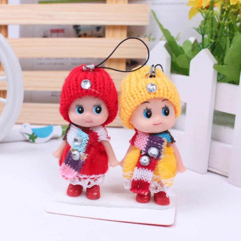 

1PC Hot Sale 8cm Kids Toys Soft Interactive Baby Dolls Key Chain Mini Doll Keychain for Boys and Girls