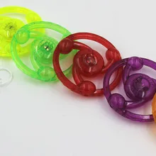 Тянуть кольцевой вспышки маховик Glow гироскопа рукой потяните летающая тарелка детские игрушки