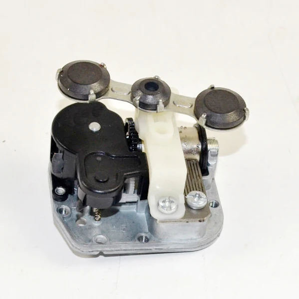 

DIY music box mechanism with three rotating magnets