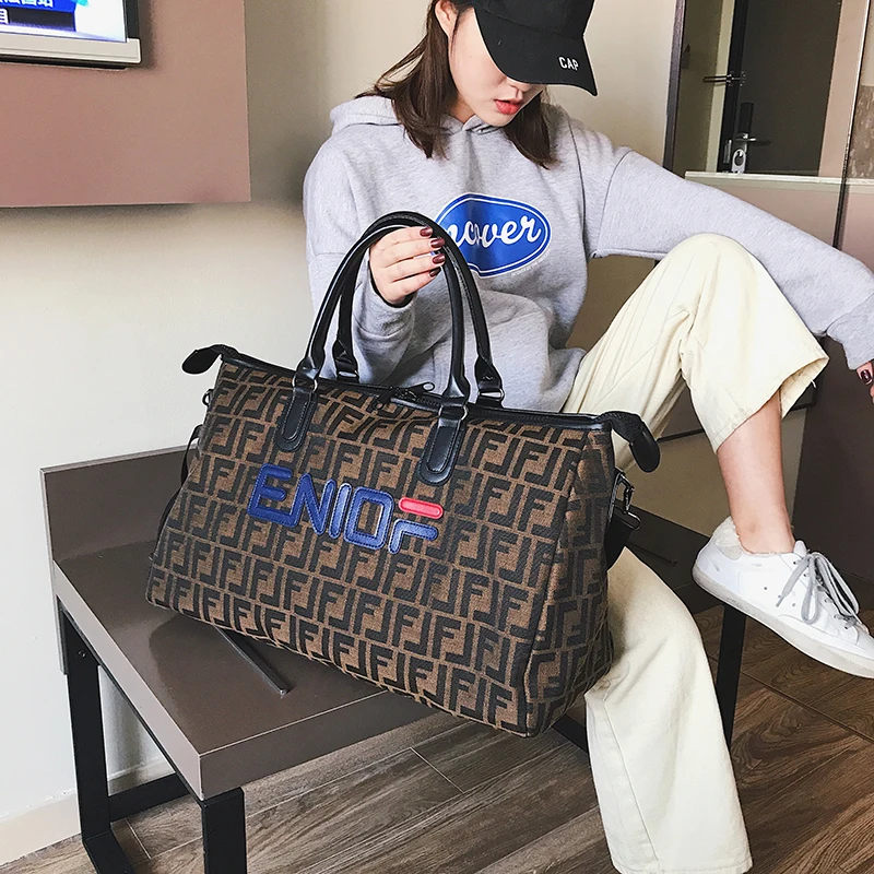 

2019 Ins Fashion Traveling luggage bag men's sports fitness fashion women's lightweight large-capacity short-distance travel bag