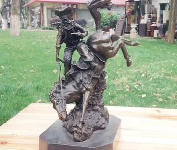 

Art Deco Sculpture Cowboy Shooter Riding Bronze Statue