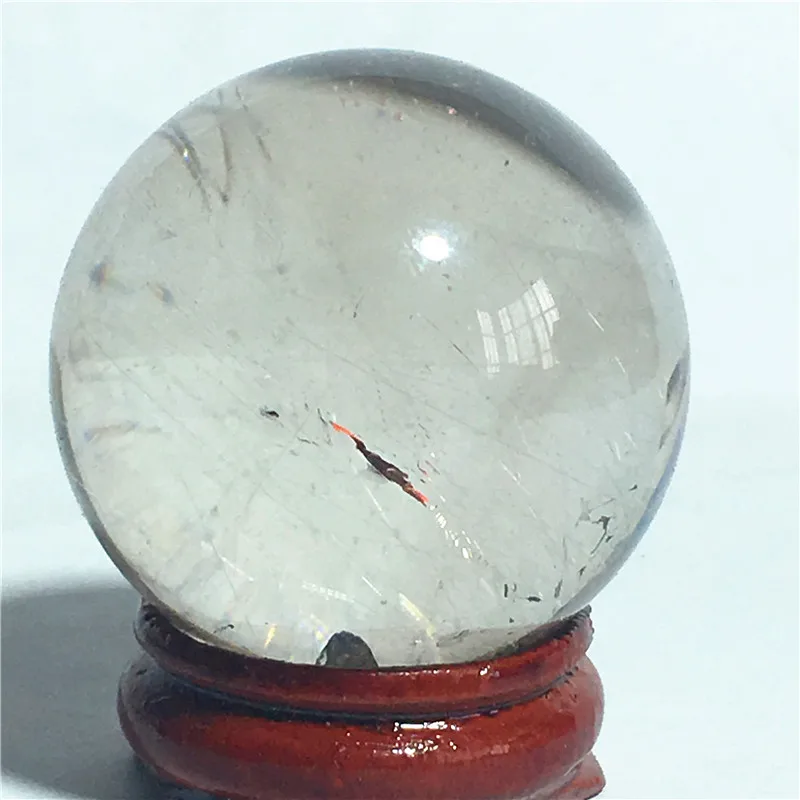 

Natural rutilated quartz crystal ball
