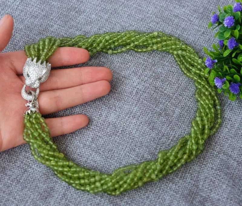 

Beautiful 8strds natural peridot necklace-zircon pendant 18"