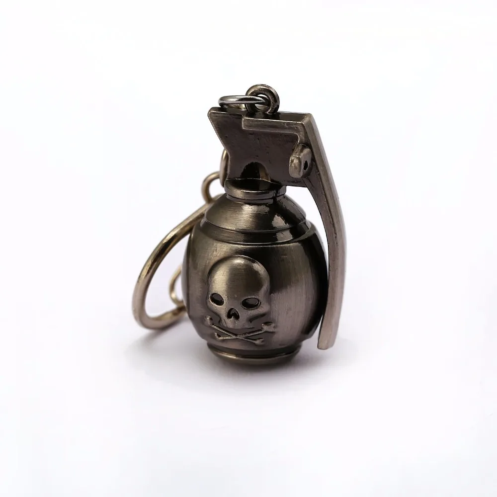 

Jewelry gun black cross fire key chain hanging for men's car battleground grenad shape skeleton pendant keychain for child toy