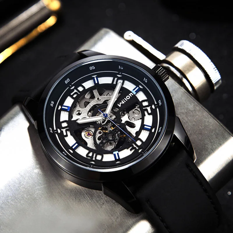 Wilon أزياء جهين الهيكل العظمي ساعة رجالي الجوف تصميم الأسود التلقائي ساعات آلية مقاومة للماء جلدية ووتش Wilon أزياء جهين الهيكل العظمي ساعة رجالي الجوف تصميم الأسود التلقائي ساعات آلية مقاومة للماء جلدية ووتش