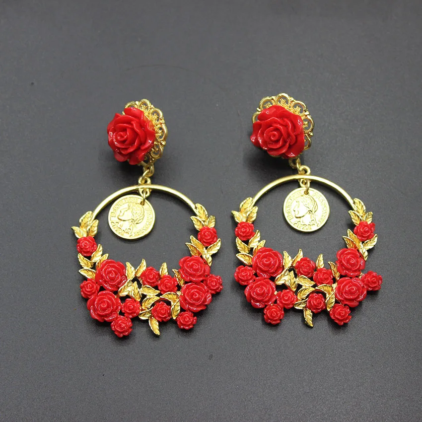 

European and American big personality simple ceramic safflower round long section tassel head earrings 149