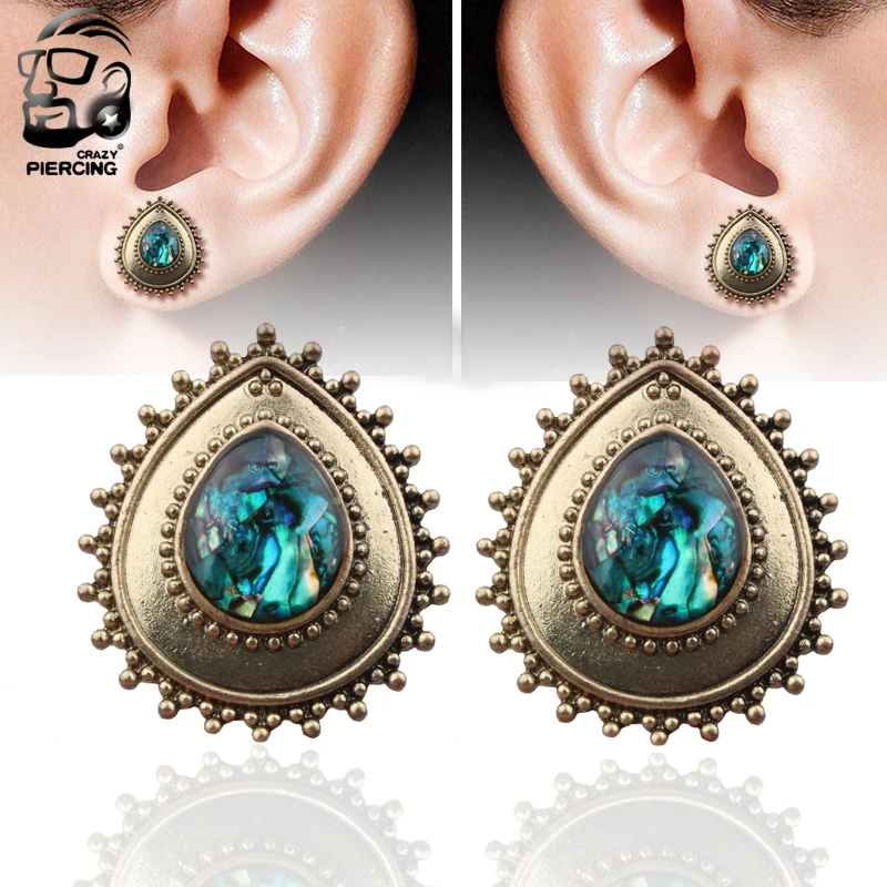 

A Pair Fashion Stainless Steel Saddle Ear Tunnels Plug Earrings Ear Expander Gauges Double Flare Fashion Body Piercing Jewelry