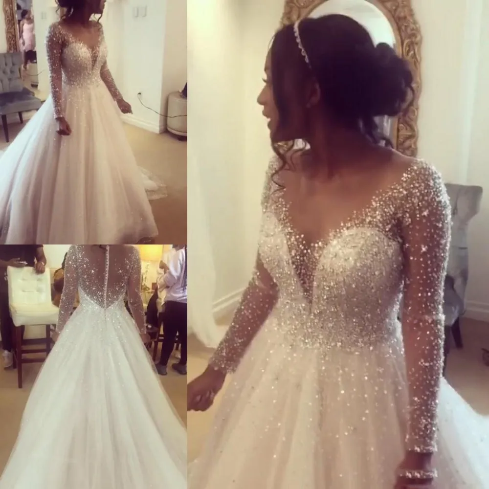 Sheer Jewel Neck A Line Boho Wedding Dresses With Long Sleeves Beaded Crystals Bridal Dresses Hollow Zipper Back Wedding Gowns For Brides