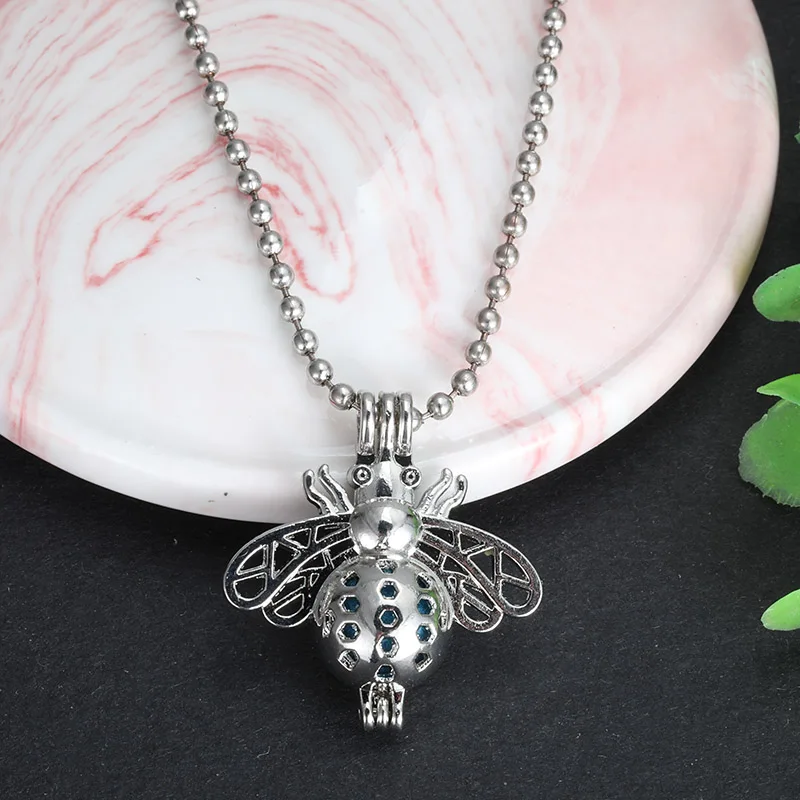

MODKISR Wholesale Fashion The Bees 6PCS Aromatherapy Cage Essential Oil Diffuser Locket Necklace Kids Girl Party Gifts A15-40