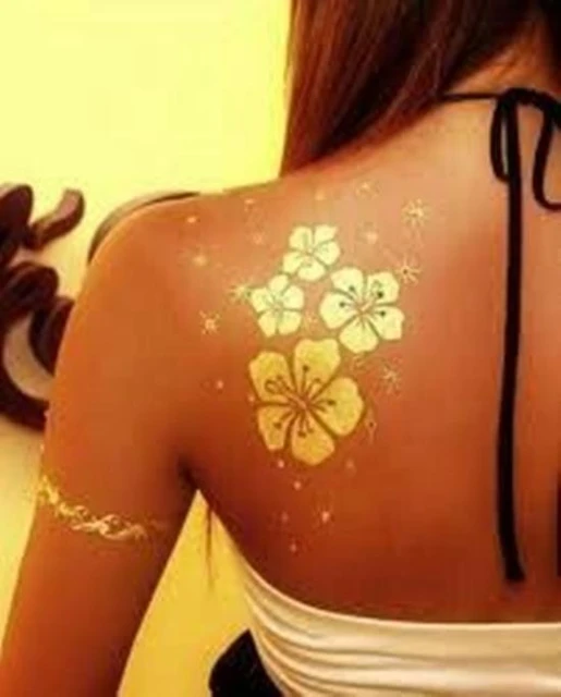 Gold Ink Tattoo