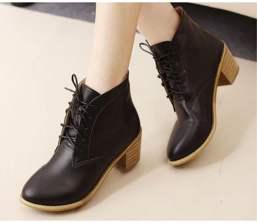 black boots with wood heel