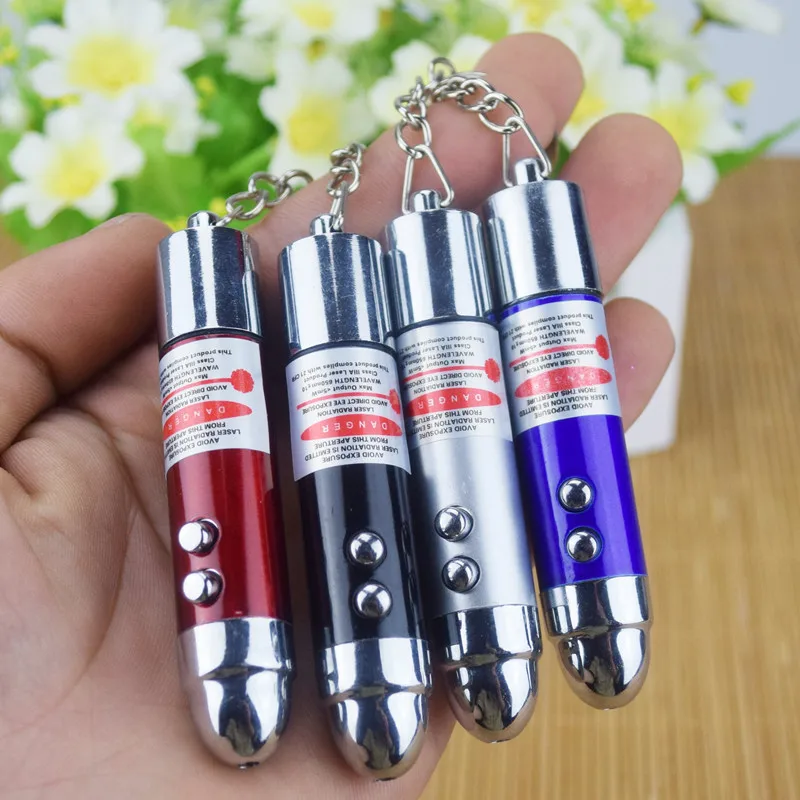 

[New] 24pcs/lot April fool's day Electric shock bullet laser lamp prank toy Trick toys key chain gift Jokes Party toy