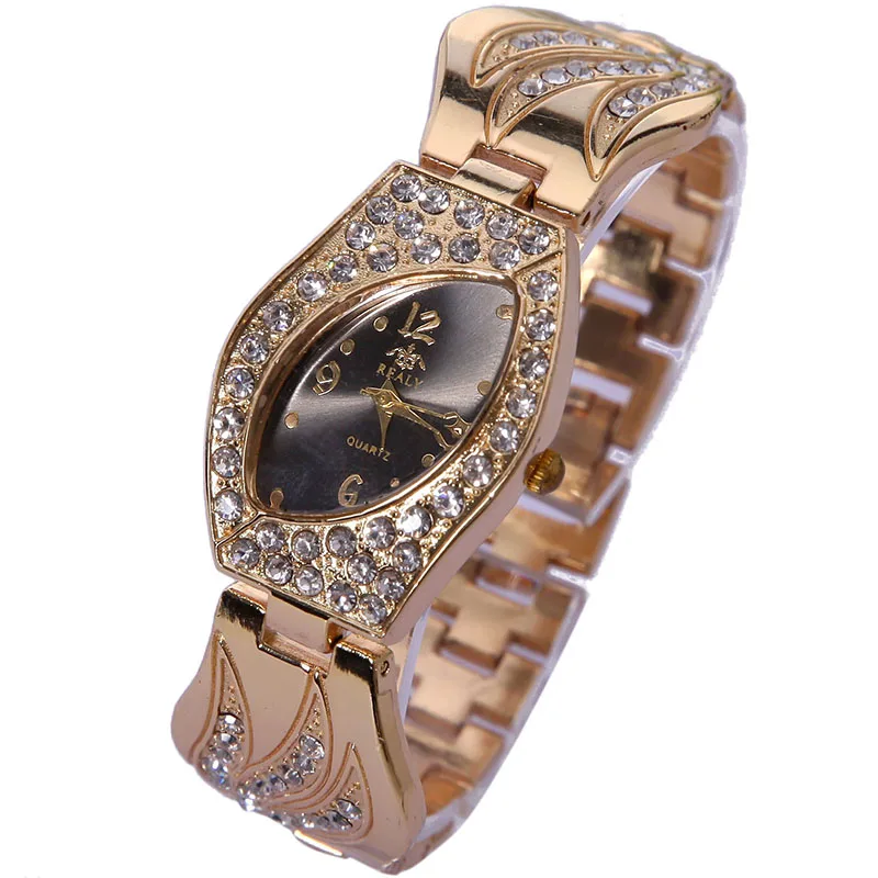 Top Gnova Platinium Rhinestone Metal Angel Feather Bracelet Watch Geneva Style Fashion Women Golden Quartz Wristwatch