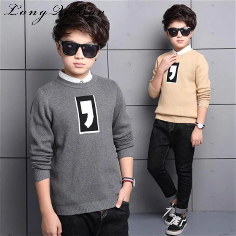 

2018 Korean version of the spring and autumn models in the big boy boy comma solid color sweater fashion tide