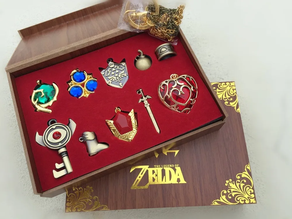 2016 Retail New The Legend of Zelda Triforce Hylian Shield Master Sword font b Keychain b
